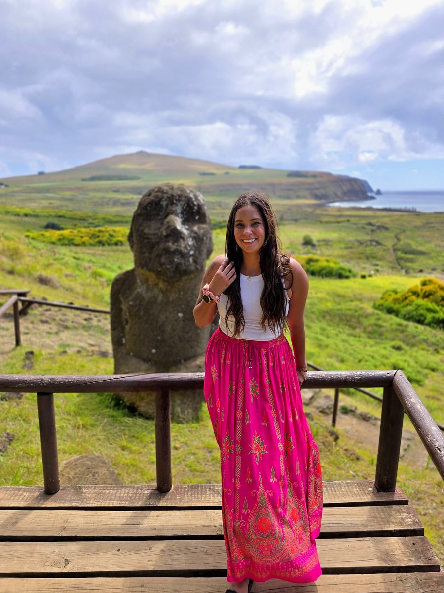 Leni beside a moai on Rapa Nui